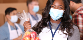 Data Stories from Giving Tuesday 2021 Masked Woman